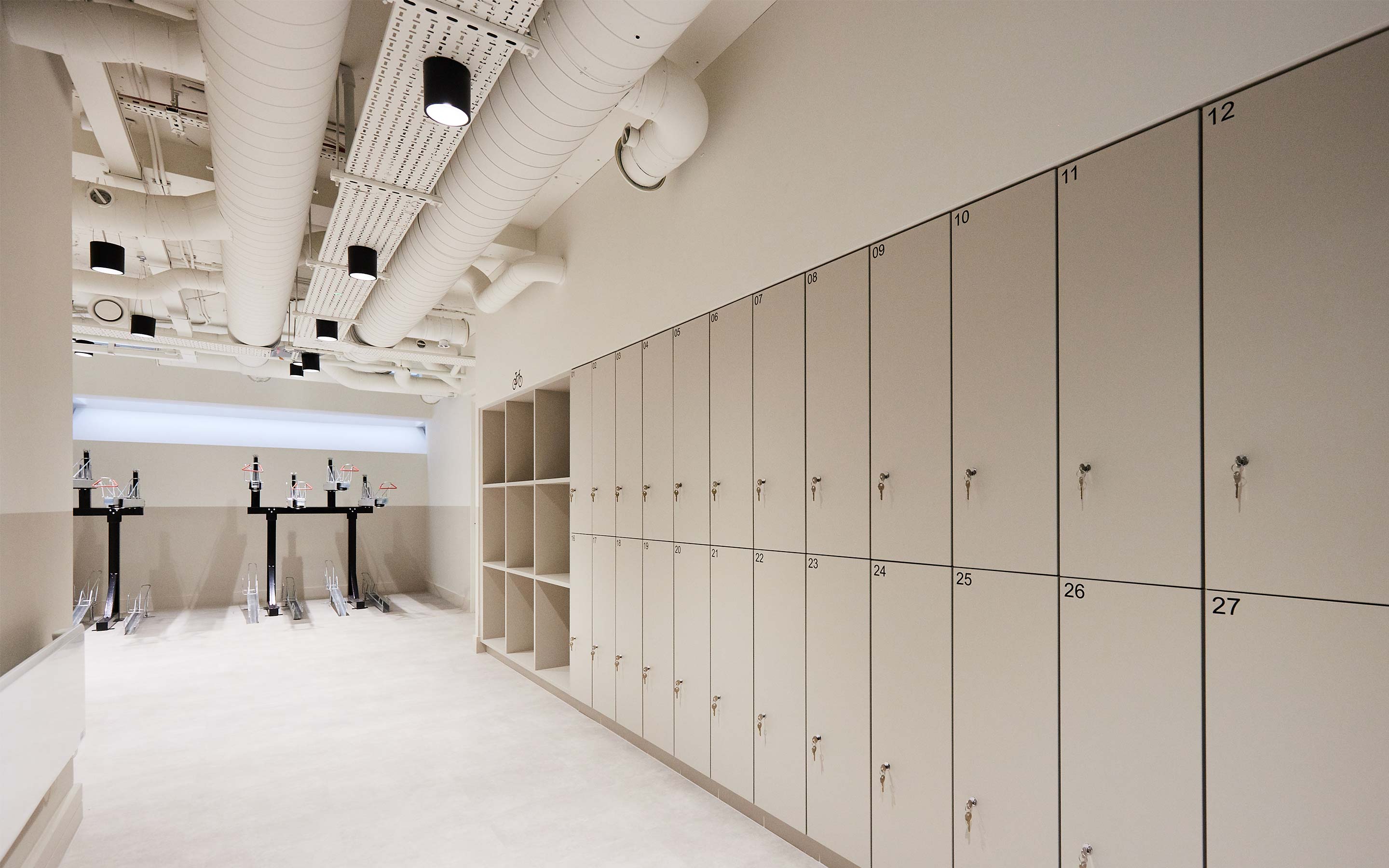 End-of-trip services such as lockers and bike storage in a contemporary office interior design